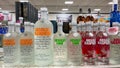 A display of bottles of flavored Absolut Vodka with background bokeh at a Binneys liqour store in Springfield, Illinois