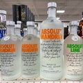 A display of bottles of flavored Absolut Vodka with background bokeh at a Binneys liqour store in Springfield, Illinois