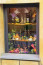 Display of bottles in a window in Montalcino town, Val d`Orcia,