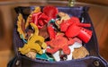 Display of colorful leather keychain accessories souvenirs shaped like animals handmade in a store in Venice, Italy