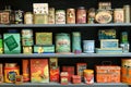 Display of colorful vintage cans on a shelf