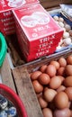 Display of a farmer shop in a traditional market in Asia showing fresh and healthy chicken and quail eggs Royalty Free Stock Photo