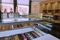 A display of French pastries and baked goods including a variety of donuts, coffee rolls, and muffins