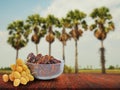 Display of fresh and dried dates on a wooden table With a blurred background. Advertising and product display ideas.