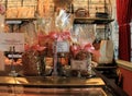 Display of fresh granolas in bow tied cellophane bags