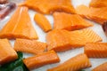 Display of frozen salmon slices for sale at a