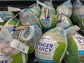 A display of frozen turkeys in the refrigerated meat aisle of a Sams Club grocery store