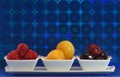 Display of fruits on a very psychedelic blue background