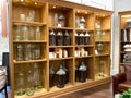 A display of glass vases and candles at a Pottery Barn at an indoor mall in Orlando, Florida