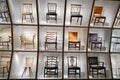 Display of iconic Danish chairs in the Designmuseum in Copenhagen , Denmark