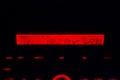 Display of the multimedia system of the car is glowing in red at Royalty Free Stock Photo