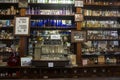 Display of old pharmacy bottles at Childers
