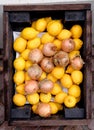 Display with onions and lemons in a flea market Royalty Free Stock Photo
