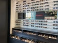 A display of Prada Eyewear, Tiffany & Co., and Dolce & Gabbana sunglasses at Sunglass Hut retail store at a mall