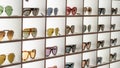 Display rack full of various sunglasses Royalty Free Stock Photo