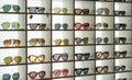 Display rack full of various sunglasses Royalty Free Stock Photo