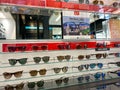 A display of Ray Ban sunglasses at Sunglass Hut retail store
