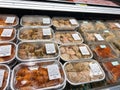 A display of ready to bake chicken dinners at a Whole Foods Market