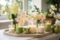 A display of scented candles in spring-inspired fragrances, arranged with botanical elements and soft lighting