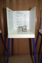 Display showing voting booth mechanism