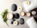 A display of spar stones, flowers, candles, towels Royalty Free Stock Photo