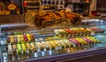 A display of tasty looking, colorful patisserie in a Florence shop, Italy