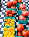Display of tomatoes in boxes Royalty Free Stock Photo