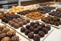 display of truffles in variety of shapes, sizes, and colors for customers to choose from Royalty Free Stock Photo