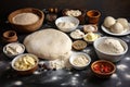 display of variety of pizza dough in different shapes and sizes, ready to be topped with a variety of ingredients