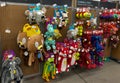 A display of various brands of colorful dog toys for sale at a Petsmart Superstore