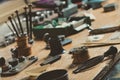 Display of a vintage watchmakers workbench with hand tools