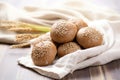 a display of whole grain bread rolls on a linen cloth Royalty Free Stock Photo