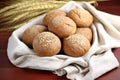 a display of whole grain bread rolls on a linen cloth Royalty Free Stock Photo