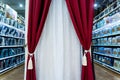 Displayed colorful curtain samples at the showroom of a large store Royalty Free Stock Photo