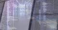 Displaying server racks with blinking LEDs in data center corridor showing code encryption overlay Royalty Free Stock Photo