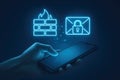 Smartphone with Firewall and Encrypted Email Icons for Cybersecurity Protection Keywords: smartphone, mobile phone, hand, person, Royalty Free Stock Photo