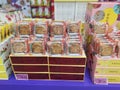 Displaying variety brands of Malaysian mooncakes food products on the shelf for sale at the supermarket.