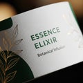 Displays Essence Elixir with the subtitle Botanical Infusion in Royalty Free Stock Photo