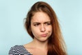 Displeased capricious moody girl pursed lips Royalty Free Stock Photo