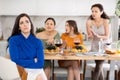 Miffed brunette during disagreement with friends at house party