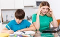 Displeased family doing homework Royalty Free Stock Photo