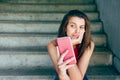 Displeased teen girl looking at her smartphone Royalty Free Stock Photo