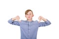 Displeased teenage boy showing both thumbs down, negative gesture bad and feedback, looking to camera isolated on white . Royalty Free Stock Photo