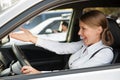 Displeased woman driving the car Royalty Free Stock Photo