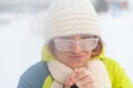 Displeased woman freezes in the cold outside. Royalty Free Stock Photo