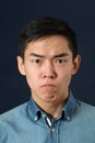 Displeased young Asian man