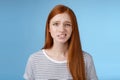 Displeased young awkward redhead girl cringe full disbelief smirking frowning confused look questioned doubtful hearing