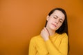 Displeased young woman feeling stiff sore neck pain concept rubbing massaging tensed muscles suffer from fibromyalgia Royalty Free Stock Photo