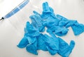 Disposable blue medical gloves lie on a white table Royalty Free Stock Photo