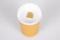 Disposable brown carton paper coffee takeout hot drinks cup in ecology concept Royalty Free Stock Photo